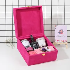 This is my signature pink velvet box, curated for Mother's Day. It's designed to be a complete at-home spa experience, filled with luxurious, handmade rose and calendula products.