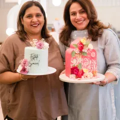 Posing with my cakes at the "Phenomenal Women 3.0" event. It was an inspiring evening celebrating enterprising women.
