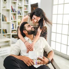 Some of the most powerful moments are the quiet ones. During this cozy indoor shoot, they were so lost in each other that they forgot I was there. This is what I strive for: natural, candid couple portraits that show the simple comfort of being together.