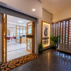 The entrance to our Yelahanka clinic, where expert dermatological care awaits. We are conveniently located and ready to help you start your journey to radiant, healthy skin and hair.