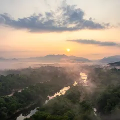 A misty sunrise over the Sharavathi river valley in the Western Ghats. This is a landscape photographer's dream, with layers of mountains, fog, and golden light.