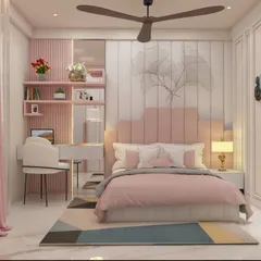 A beautifully designed kid's bedroom in shades of pink and white, featuring a custom headboard and an integrated study area. The room is adorned with playful wall art and soft lighting to create a charming and inspiring personal space.