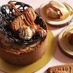 Here you can see the details of my Biscoff cheesecake, from the chocolate work to the piped cream and biscuit garnish. I love making my desserts look as good as they taste.