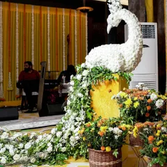 A detailed shot of one of the floral peacock sculptures from the Teej event. The intricate work showcases our commitment to creating unique, handcrafted decor elements that elevate the entire celebration.