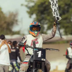 Taking the checkered flag to become the first-ever champion of the Royal Enfield Slide School Cup. This victory in Jaipur was a historic moment for me and the team.
