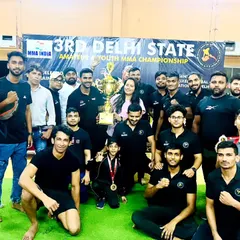 Victory feels best when shared with your parivaar. This is our team celebrating with the first prize trophy at the 3rd Delhi State Amateur & Youth MMA Championship. We came, we fought, and we conquered together, bringing home 8 gold medals.