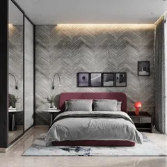 This Parisian-inspired bedroom uses a herringbone-patterned wallpaper and a rich magenta headboard to create an opulent yet cozy feel. The design proves that pink can be sophisticated and powerful.