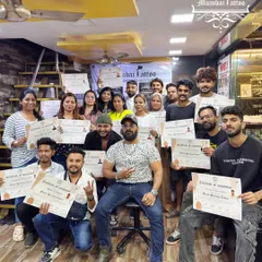 This is the goal. A group of our latest certified piercers, holding their certificates of completion. We are incredibly proud of our students and love seeing them ready to start their professional journey with the right skills and knowledge.