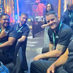 Our coaches enjoying the fights from the sidelines at an MFN event. We are passionate students of the game.