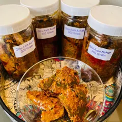 It's mango season, which means it's time for my classic North Indian style Aam ka Achaar. This is the spicy version, also called Gila Aam Achar, made with raw mango chunks and a blend of traditional spices.