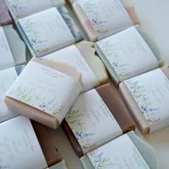 Rows of beautifully wrapped soaps, ready to be gifted to guests.