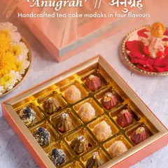 The 'Anugrah' box contains handcrafted tea cake modaks in four different flavors. They are delicate, sweet, and a perfect fusion of tradition and modern baking.