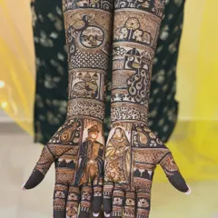 A perfect example of personalized bridal mehendi. I incorporated detailed portraits of the bride and groom, along with other significant motifs like a palanquin, peacocks, and elephants, to tell their unique love story.
