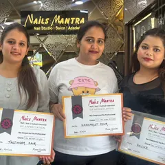 A group of happy students posing with their certificates after successfully finishing their professional training. It’s always a proud moment for us to see our students graduate.
