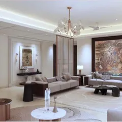 An expansive view of a modern 4BHK apartment living room at Platinum Tower, Gurgaon. This full interior renovation features a neutral color palette, statement art, and layered lighting to create a sophisticated and welcoming space.