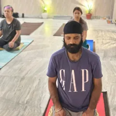 Participants deeply involved in their Angamardana practice. This system invigorates the body, bringing a sense of lightness and freedom. It is a practice of tremendous antiquity, offered today in its purest form.