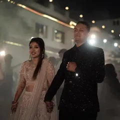 Here is another groom in one of my black designer suits. The entire jacket is handcrafted with katdana work, making it a centerpiece for a wedding reception.