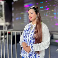 A look back at a successful financial year. This look, with a white and blue embroidered top, was from a live festival event, one of many highlights from a year filled with concerts, corporate events, and awards.
