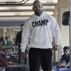 Walking into the gym wearing my "Champ" hoodie. This is the mindset we cultivate here. We are all champions in our own journey.