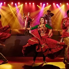 Energy and color fill the stage during a folk-dance performance. Our live studio nights often incorporate vibrant dance segments that complement the musical acts, adding another layer of dynamic entertainment.