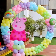 A circular balloon photo frame with a large Peppa Pig cutout. It's a fantastic spot for kids and families to take memorable pictures.