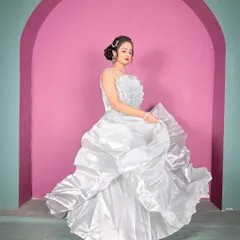 The movement of this gown is spectacular. Renting this piece allows you to have a high-impact look for your photos without the high cost.