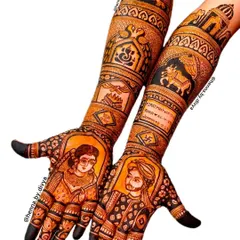 This stunning bridal mehendi features lifelike portraits of the bride and groom in their wedding attire. The arms are adorned with traditional motifs, including a depiction of the Nandi bull and other sacred symbols.