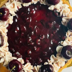 A close-up on the glossy cherry topping and the plump, fresh cherries that make this tart so irresistible.