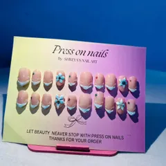 A beautifully lit shot of the 3D shell art set. This design is perfect for anyone looking for unique, dimensional nail art that feels both elegant and playful.