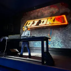 On stage, in my element. A professional setup is key for a large-scale event, and my custom LED visuals with Pioneer gear ensure the show looks as good as it sounds. This is my command center.