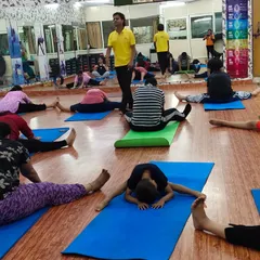 A wider view of our studio during a flexibility session. I provide individual attention to each student, ensuring they are practicing correctly and safely.