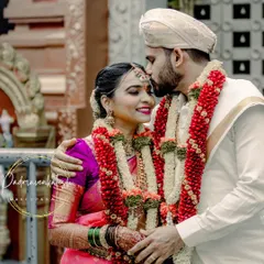 A beautiful couple portrait that captures the joy of the wedding day. The bride's makeup is designed to look fresh and timeless, enhancing her features without overpowering them.