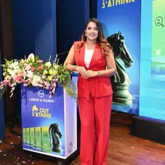 A full-length shot by the podium at the Larsen & Toubro 'OutThink 25' event. I was proud to host this competition for top B-school students.