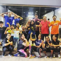 Beyond dance, the studio is a fantastic venue for fitness classes like Zumba. The mirrored wall helps everyone check their form, and the energetic atmosphere keeps motivation high, as you can see from these happy faces after a great workout.