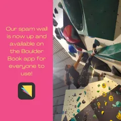 Here's a climber tackling a tough problem on an overhang section of our wall. Our gym offers a wide variety of angles and holds to challenge every skill level.