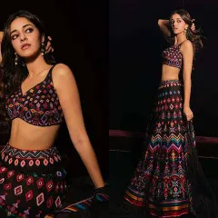 This multi-colored geometric print lehenga is a great example of a modern, festive design. I can work with various printed fabrics to create a unique and eye-catching party wear lehenga.