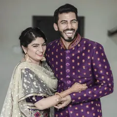 Capturing pure, unscripted joy is what I love most. This candid shot from a couple's portrait session shows a moment of genuine laughter, reflecting their unique connection. My approach is to create a relaxed atmosphere where you can be yourselves, allowing for authentic wedding photography.