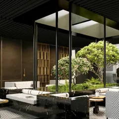 For this executive floor, we designed a central green courtyard under a large skylight. This biophilic design feature brings sunlight and nature into the heart of the office, providing a calm, refreshing space for informal conversations or quiet relaxation.