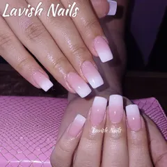A glossy and perfectly blended baby boomer ombre on square-shaped nails.