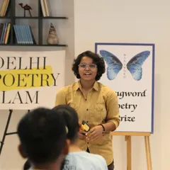 A young poet takes the stage at our 'Chai & Poetry' event. We challenge students to perform a powerful poem in just 60 seconds.