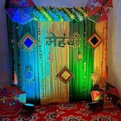 The Mehndi backdrop under blue and yellow lighting, showcasing the versatility of the setup.