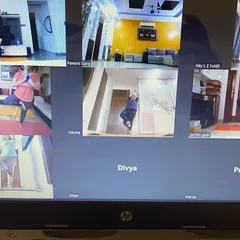 Here, my students are exploring different balancing poses like Tree Pose. It's wonderful to see each person finding their stability and focus in their own space. Our online group sessions are all about progress, not perfection.