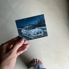 Another shot of the tiny BMW canvas, held in hand to show the scale. These miniature car portraits are a great way to celebrate a car you love.