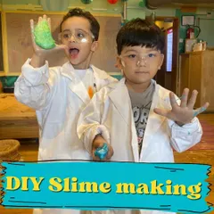 The joy of successful slime! These two are thrilled with their gooey creation. Our science experiments are designed to be fun, safe, and wonderfully messy.