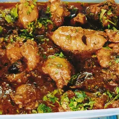This is our pepper chicken gravy, a rich and aromatic dish made from scratch for each order. We can adjust the spice level and it pairs wonderfully with our homemade sheermal naan.