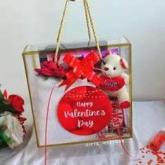 It's time to pamper your boy! This budget-friendly Valentine's hamper for him includes a shirt, photo frame, teddy bear, and chocolates.