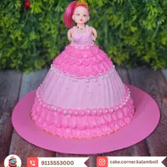 A beautiful pink princess doll cake, where the cake itself forms the gown. Decorated with pearls and ruffles, it's a classic and elegant choice for a birthday girl.