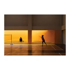 The badminton court at the Meraki Clubhouse is defined by a warm, ambient glow. We designed the lighting to be indirect and atmospheric, creating a pleasant playing environment that feels distinct from a typical sports hall.