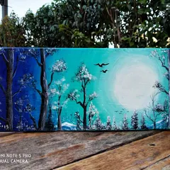 A landscape painting I did using acrylics on a wooden sheet. I love how the texture of the wood adds to the feel of the forest scene. This piece captures a peaceful moonlight view with birds in the sky.