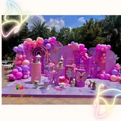 A first birthday should be pure magic. I brought this butterfly theme to life with a vibrant pastel palette, custom props, and a sea of balloons, creating an enchanting outdoor wonderland for a very special little girl.